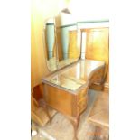 Fine burr walnut bedroom suite containing kidney shaped dressing table with glass top,