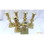 Selection of six brass candlesticks