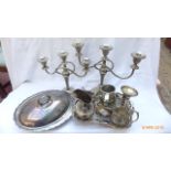 Selection of plateware including 2 three arm plated candle holders, lidded plated breakfast dish,