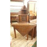 Carved oak corner display table unit,