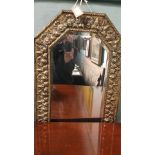 Embossed brass framed bevel edged rectangular wall mirror