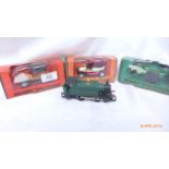 3 Boxed Matchbox vintage car models and a smaller Great Western Railway locomotive