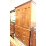 Early 19th century figured mahogany secretaire the upper double panel fitted three storage shelves,