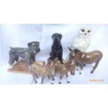 Selection of animal ornaments including a Royal Doulton snowy owl, Royal Doulton Schnauzer,