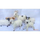 6 Beswick animal ornaments including 2 rams, black faced ewe, lamb,