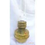 Early 20th century brass oil lamp with shaped glass flue
