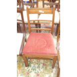 Oak framed dining chair the padded seat upholstered in pink dralon