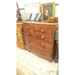 Mahogany bow fronted Victorian chest of two short and three long drawers each with bobbin handles