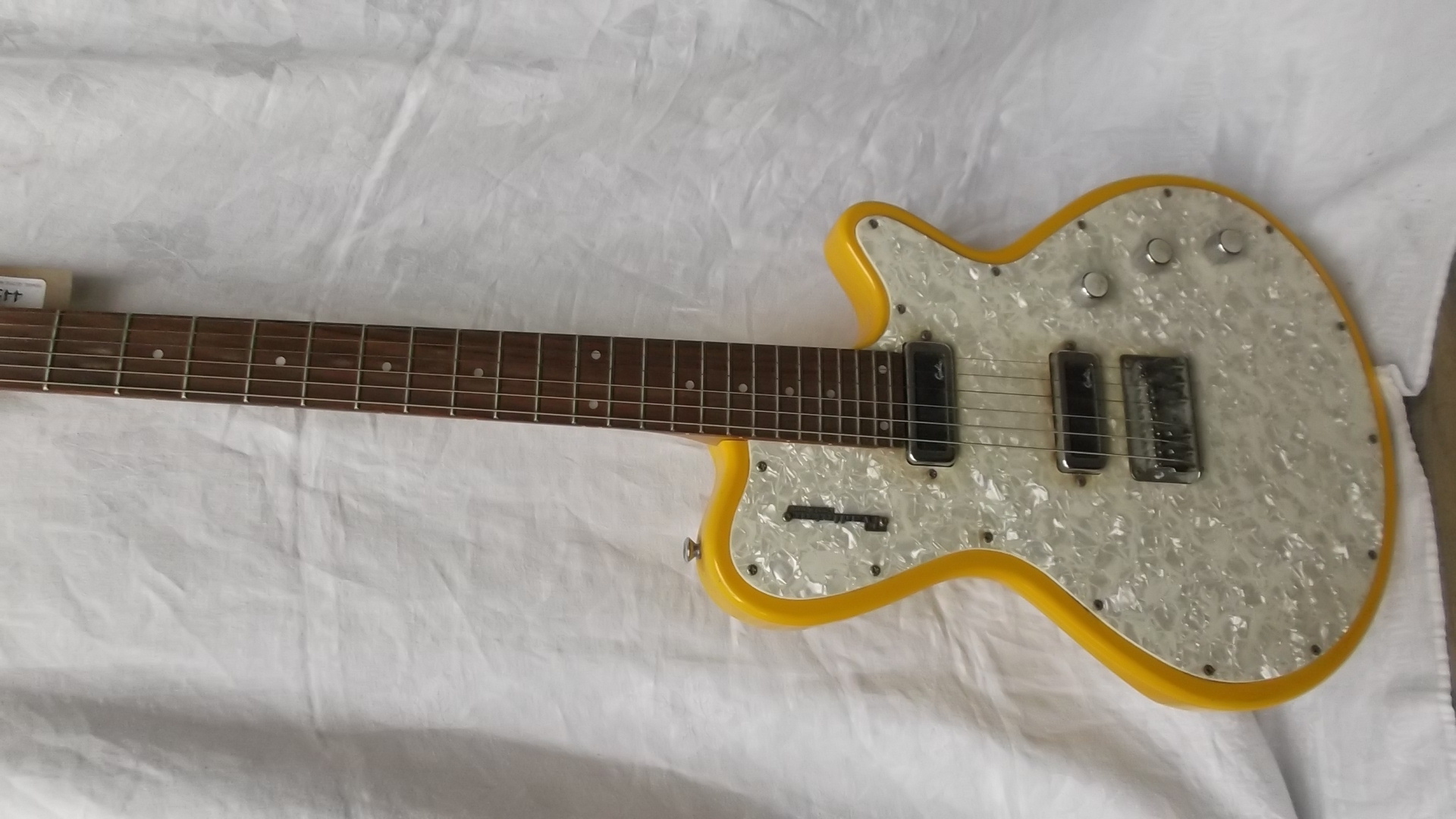 Godin radiator electric guitar in yellow case made in the USA,