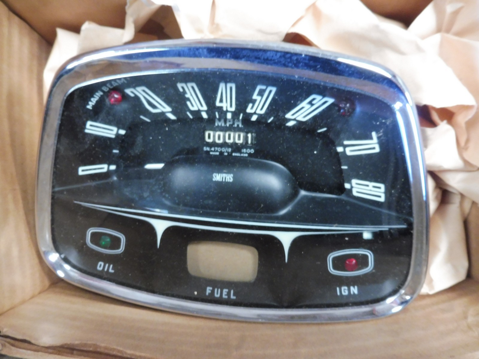 A Smiths 0-80mph speedometer, by repute to suit Austin A35 and new old stock.