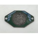 An Art Deco green and blue enamel French dealership supply plate with central St. Christopher badge.