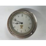 A Smiths silver faced eight day car clock.