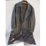 A German black leather motorcycling coat.