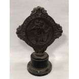 A St. Christopher car badge, display base mounted.