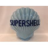 A Continental blue Super Shell glass petrol pump globe in good condition.