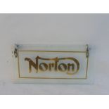 A Norton bevelled glass hanging showroom sign on chains, 15 3/4 x 8".