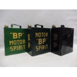 Three different BP two gallon petrol cans.