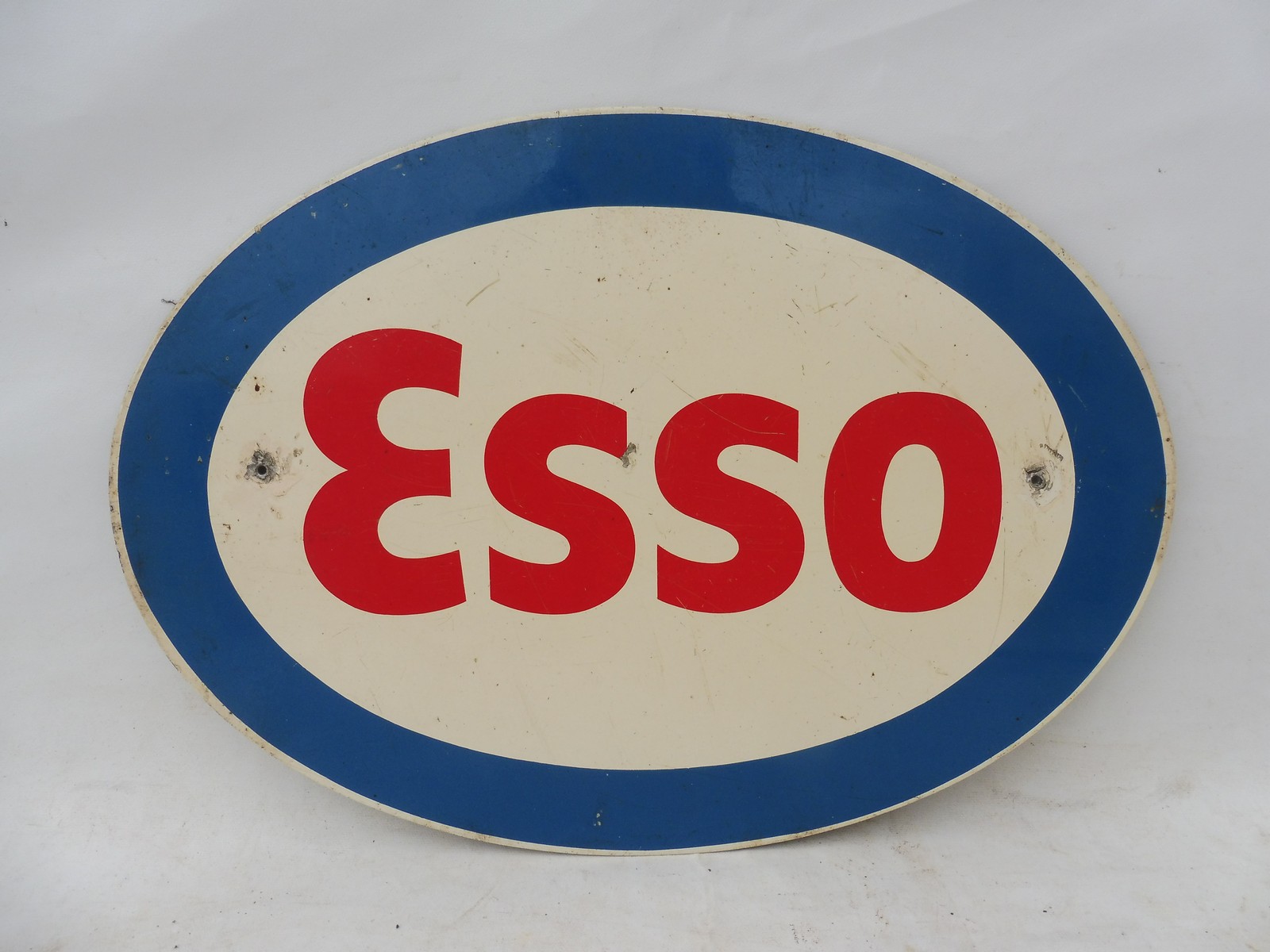 An Esso oval tin advertising sign, 18 x 12 1/2".