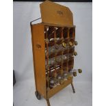 An NBC oil bottle trolley containing four correct quart oil bottles and eight pint oil bottles.