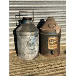 A Fina five gallon pyramid can and an Esso Blue Paraffin five gallon can.