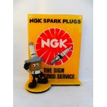 An NGK Spark Plugs 'Sparky' dealership display sign, 14" wide x 18" high.