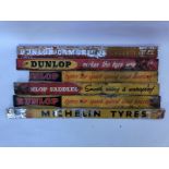 Five Dunlop shelf strips and a Michelin shelf strip.