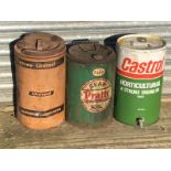 A Pratts Gear Oil five gallon drum and two others.