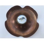 A rare Blue Bird Petrol copper ashtray with circular disc to the centre, stamped F.W. Miller.