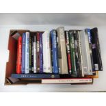 A box of motoring volumes, mostly motorsport.