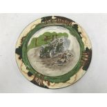 A Royal Doulton motoring related plate titled 'A nerve tonic' depicting an Edwardian motorcar,