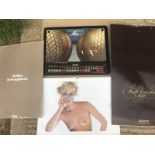 Four Pirelli calendars.