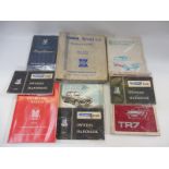 A collection of Triumph related handbooks, spare parts catalogues etc. including TR2, TR4 etc.