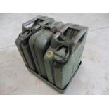 A pair of miniature jerry cans in carrier for use on a Continental motorcycle.