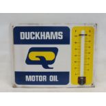 A Duckhams Motor Oil rectangular enamel thermometer by Burnham of London, lacking tube, 26 x 20".