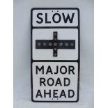 A Slow Major Road Ahead plastic road sign, with integral glass reflectors, 14 x 27 1/2".