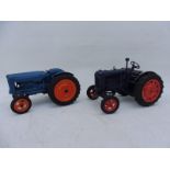 Two Chad Valley die-cast Fordson tractors.