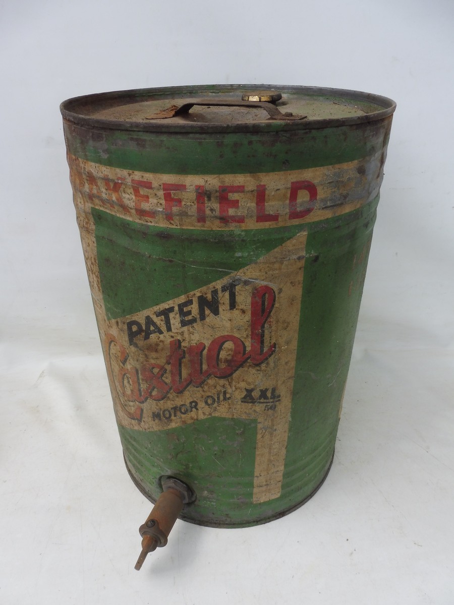 A Wakefield Patent Castrol Motor Oil ten gallon drum, XXL grade, with dispensing tap.