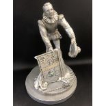 A rare Raleigh Industries advertising figure depicting Sir Walter Raleigh holding a plaque.