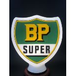 A reproduction BP Super shield shaped glass petrol pump globe.