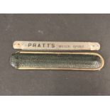 A Pratt's Motor Spirit metal rule in case.