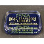 A Road Transport and General Insurance Company Limited rectangular glass paperweight, in good
