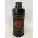 A Shell Gear Oil cylindrical quart can with original cap on bulkhead bracket.