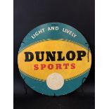 A Dunlop Sports circular cardboard tyre insert advertisement, 24" diameter.