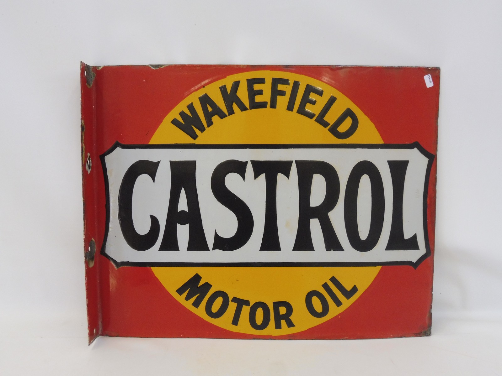 A Wakefield Castrol Motor Oil double sided enamel sign with hanging flange, in near mint