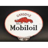 A Mobiloil Gargoyle oval double sided oil cabinet pediment sign, 15 x 12 1/4".