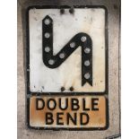 An original Double Bend road sign with integral glass reflectors and brackets to the rear, 14 x