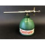 A Castrollo Upper Cylinder Lubricant plastic dispensing gun.