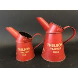 A pair of date matched 1947 graduated Thelson Motor Oils jugs.