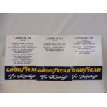 Three Goodyear plastic information plaques.