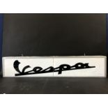 A Vespa single sided showroom illuminated lightbox, 46" wide x 9 1/2" high x 4" deep.